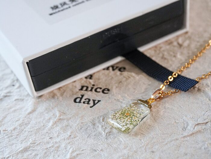 Handmade Resin Mustard Seed White Flower Necklace - Image 4