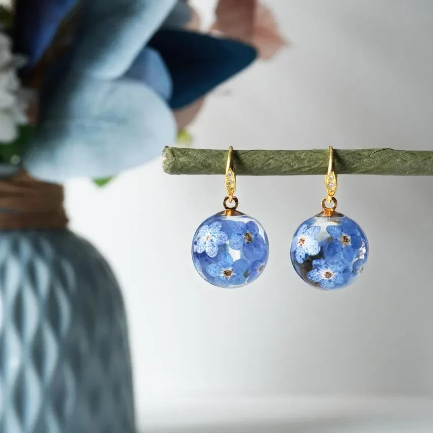 il_1140xN.6745289323_4gmy Handmade Resin Forget-Me-Not Ball Earrings - Image 1