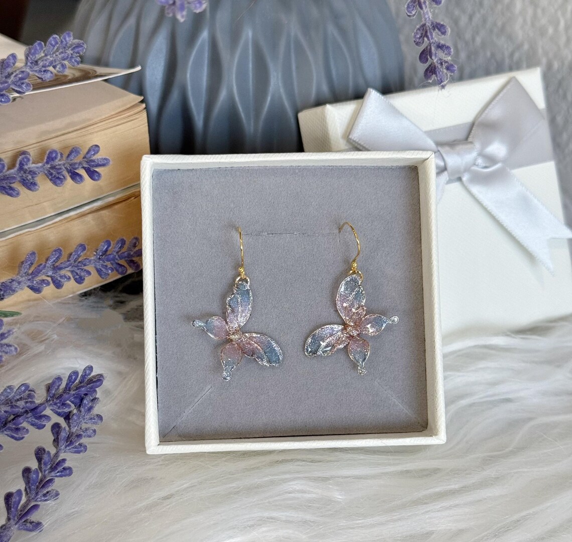 il_1140xN.6802851737_gh06 Handmade Resin Butterfly Dangle Earrings - Image 1