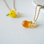 Czech Glass One Orang Necklace: White Flower, Titanium Steel Chain - Image 3