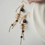 Handmade Resin Planet Earrings with Spiral Metal Ring & Star Chains - Image 4