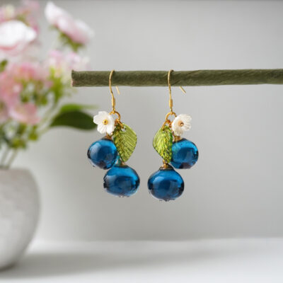 Handmade blueberry resin dangle earrings with gold ear wires, white flower and green leaf charms