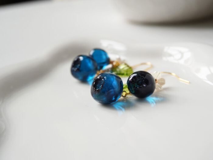 Lunoriah Studio handmade blueberry resin earrings with gold ear wires and floral charm